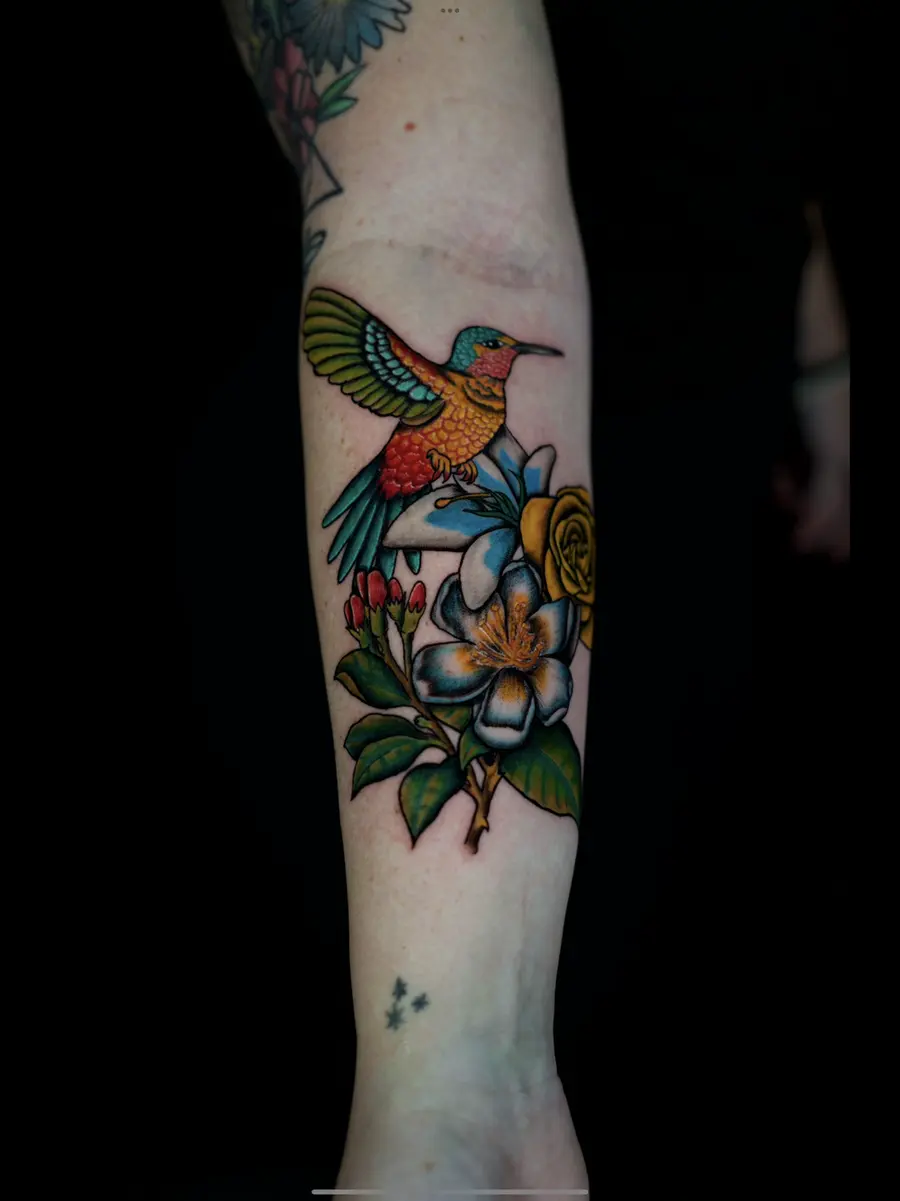 Full-color hummingbird tattoo by Clayton Parnell, West Palm Beach