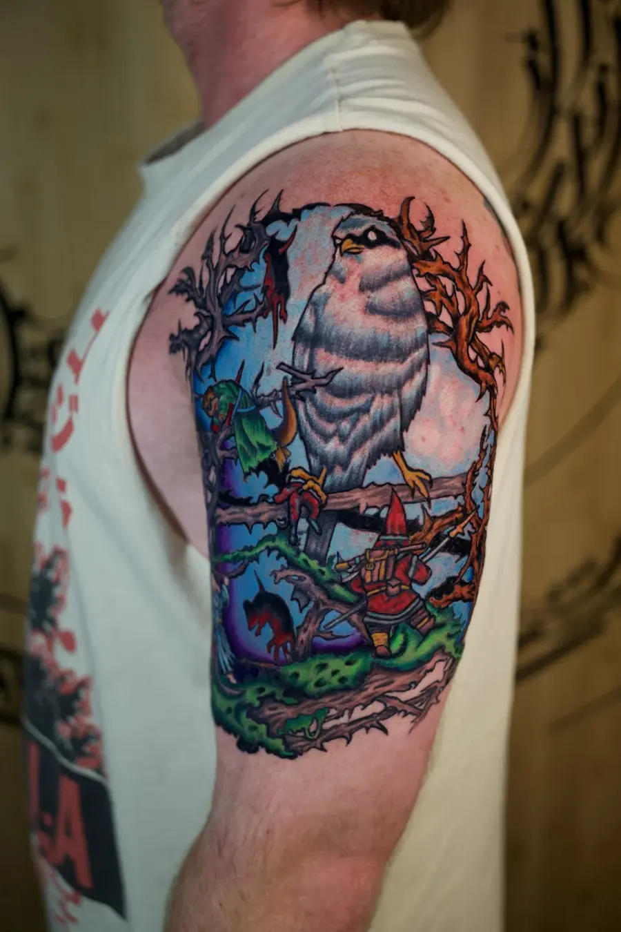 Full-color mountain scene tattoo by Clayton Parnell, West Palm Beach