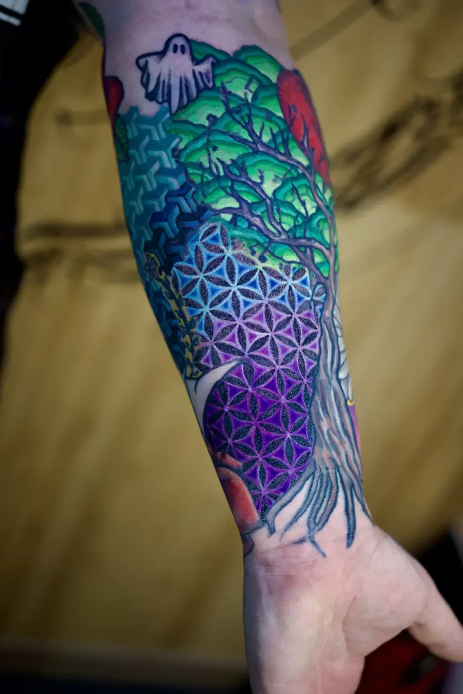 Full-color forearm tattoo by Clayton Parnell, West Palm Beach